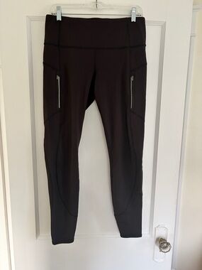 Athleta Rainer insulated leggings black w/side zip pockets Women’s size L